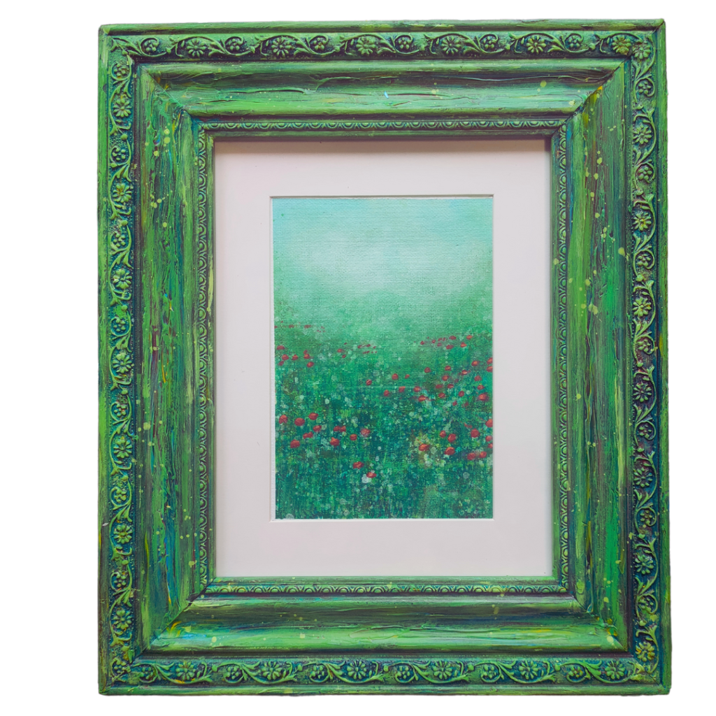 a green frame with an abstract painting on it